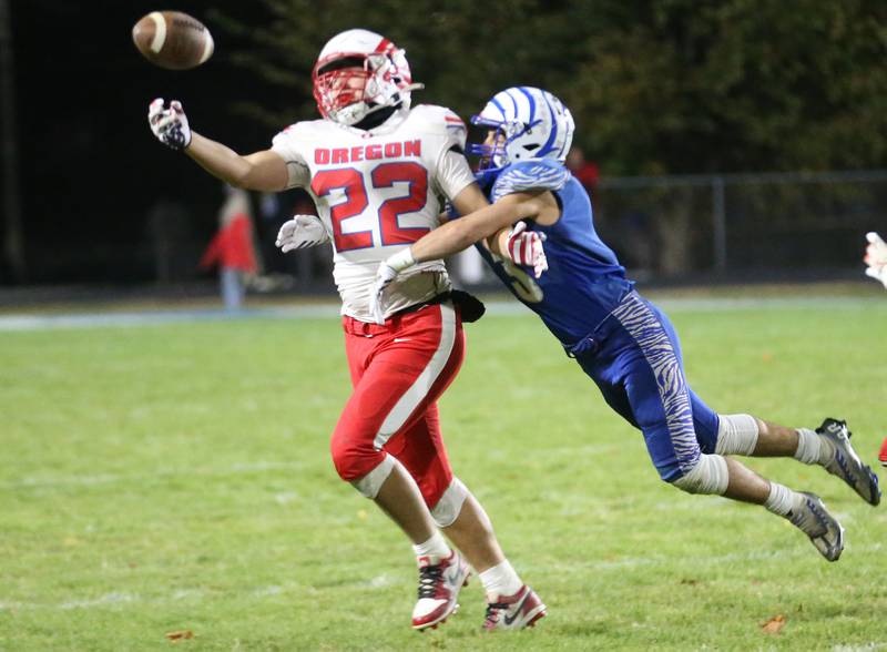 Princeton's Ace Christiansen breaks up a pass intended for Oregon's Kade Girton during the Class 3A playoff game on Friday, Nov. 1, 2024 at Princeton High School.
