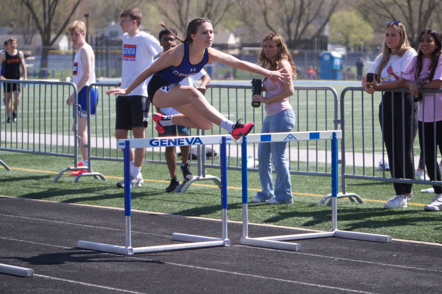 Geneva's Maddie Salzman competes in the Girl's 4x100Shuttle Hurdles at the 31st Annual Mike VanDeveer Track and Field Invitational on Saturday April 15,2023 in Geneva.