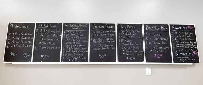 The Butcher Shop specials are seen on the new store’s chalkboard display on Wednesday, May 10, 2023.