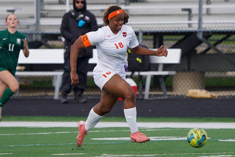 Oswego’s Jordyn Washington (18) dribbles the ball up field on a fast break against Bartlett during a soccer mach in the Plainfield Classic  at Plainfield North High School on Tuesday, April 15, 2025.