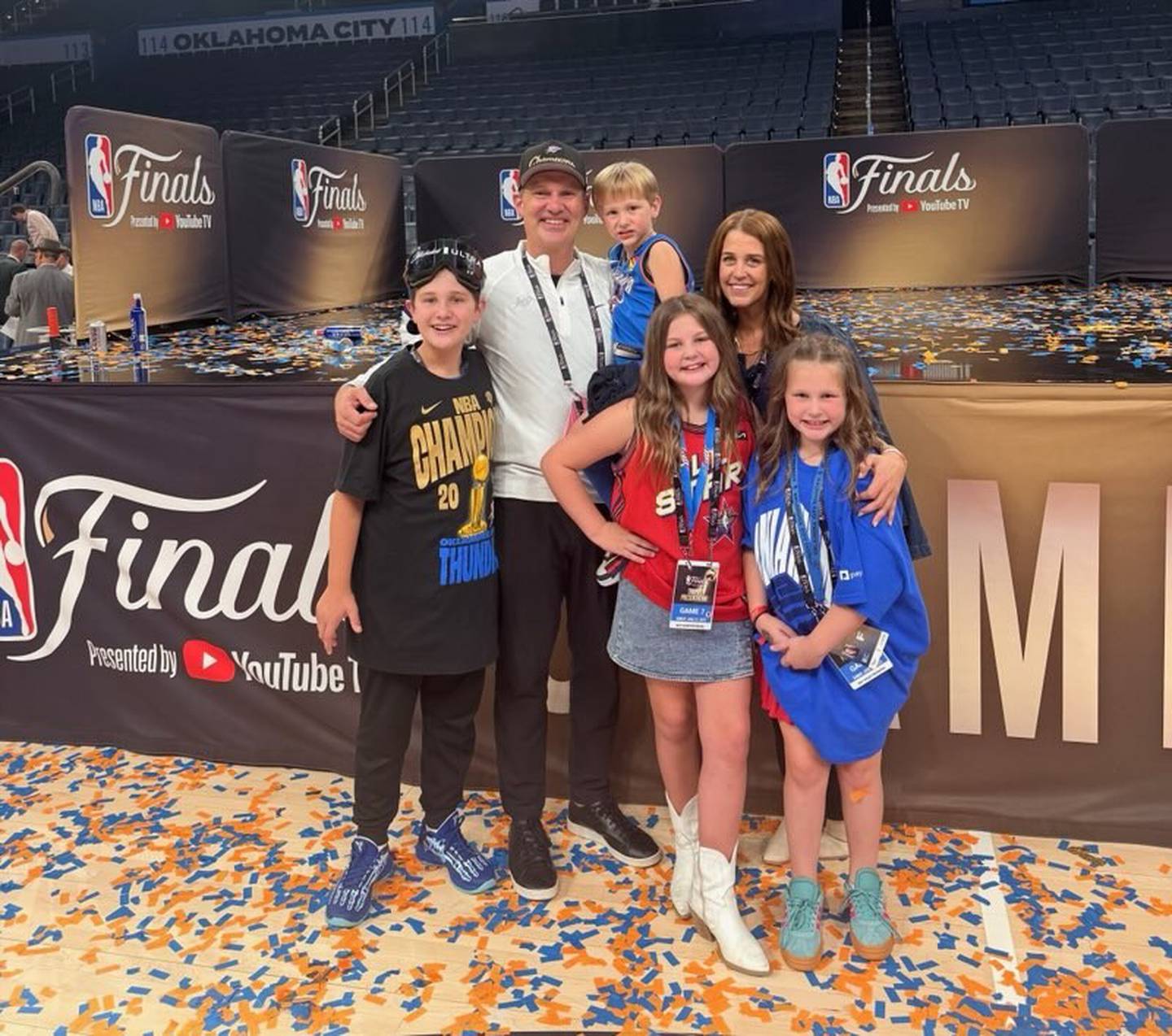 Matt Tumbleson celebrated the Thunder's NBA Championship on the arena floor  with his wife, Christina, and children, Teddy, Abe, Audrey, and Liv.
