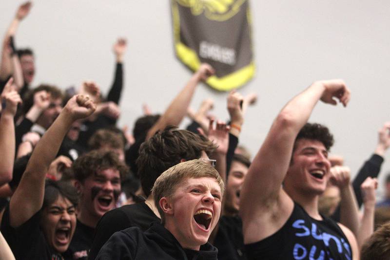 Marmion Academy fans get revved up during IHSA Class 3A Sectional title game action at Burlington Central High School Friday night. The Cadets advanced with a win over the host Rockets.