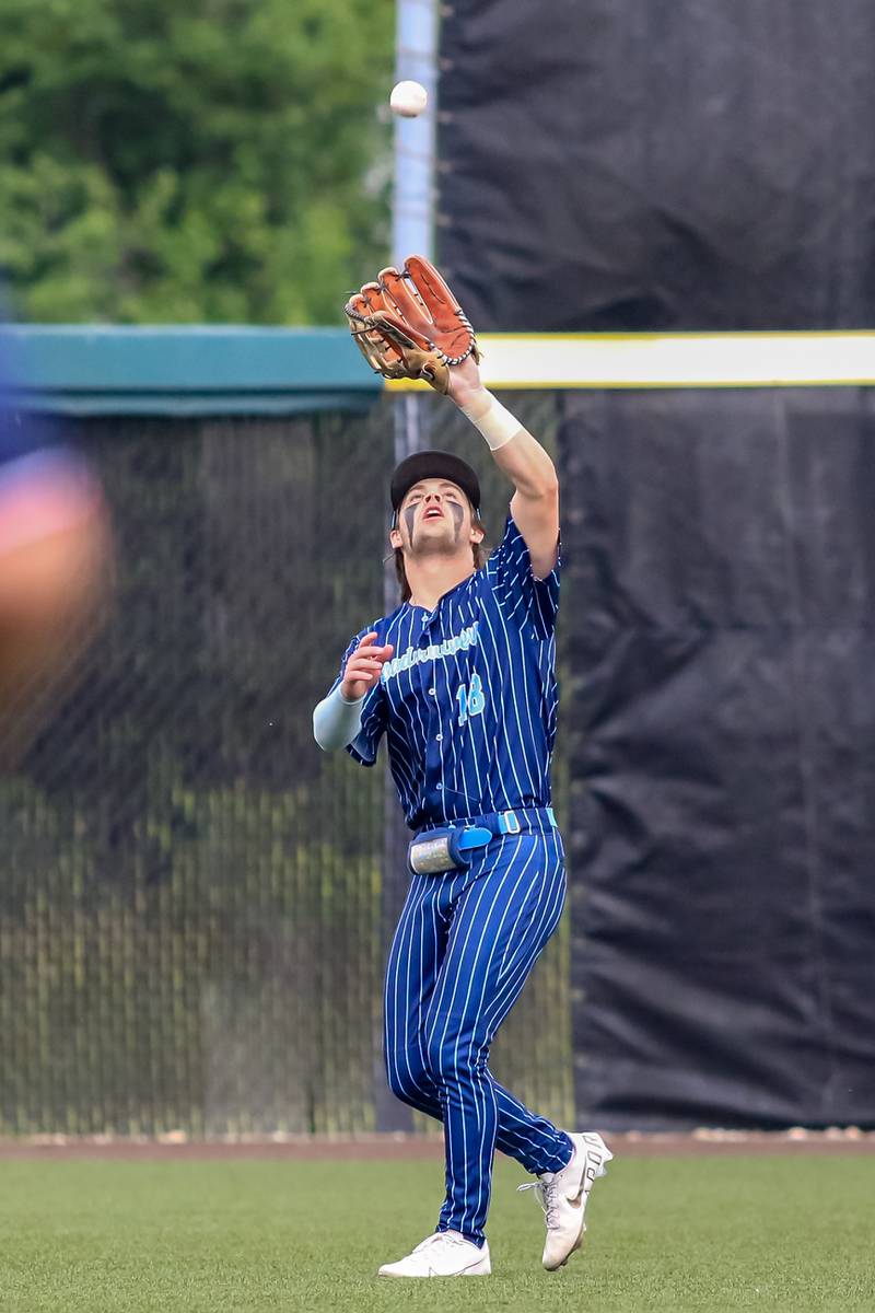 Nazareth's Lucas Smith (18) catches a fly ball during the Class 3A Crestwood Supersectional game between St. Ignatius at Nazareth.  June 6, 2022.