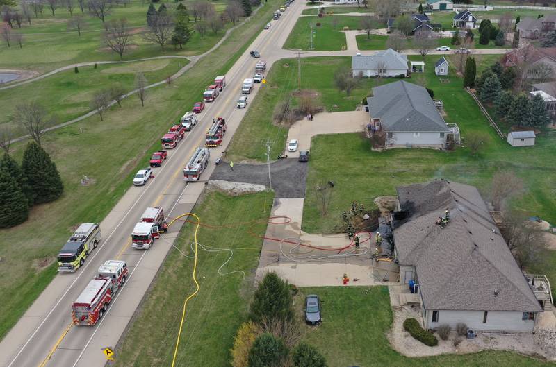 An aerial view of a structure fire in the 600 block of U.S. Route 6 on Tuesday, April 1, 2025 in La Salle. Fire departments from Peru, La Salle, Utica, Troy Grove, Wallace, Spring Valley and Oglesby were dispatched just before 2:30 to a one-story dublex home.