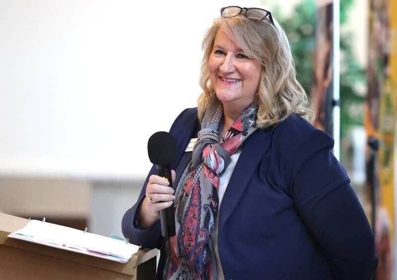Resource Bank President and Chief Executive Officer Diana Shott accepts the Sycamore Chamber of Commerce Outstanding Business of the Year Award on behalf of the bank during the 106th Annual Chamber Meeting Thursday, March 2, 2023, in Memorial Hall at St. Mary's Catholic Church in Sycamore.