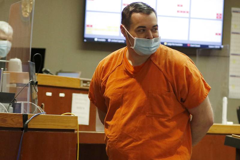 Jonathan Van Duyn is led out of Judge Robert Wilbrandt's courtroom on Thursday, May 27, 2021, at the Michael J. Sullivan Judicial Center in Woodstock.