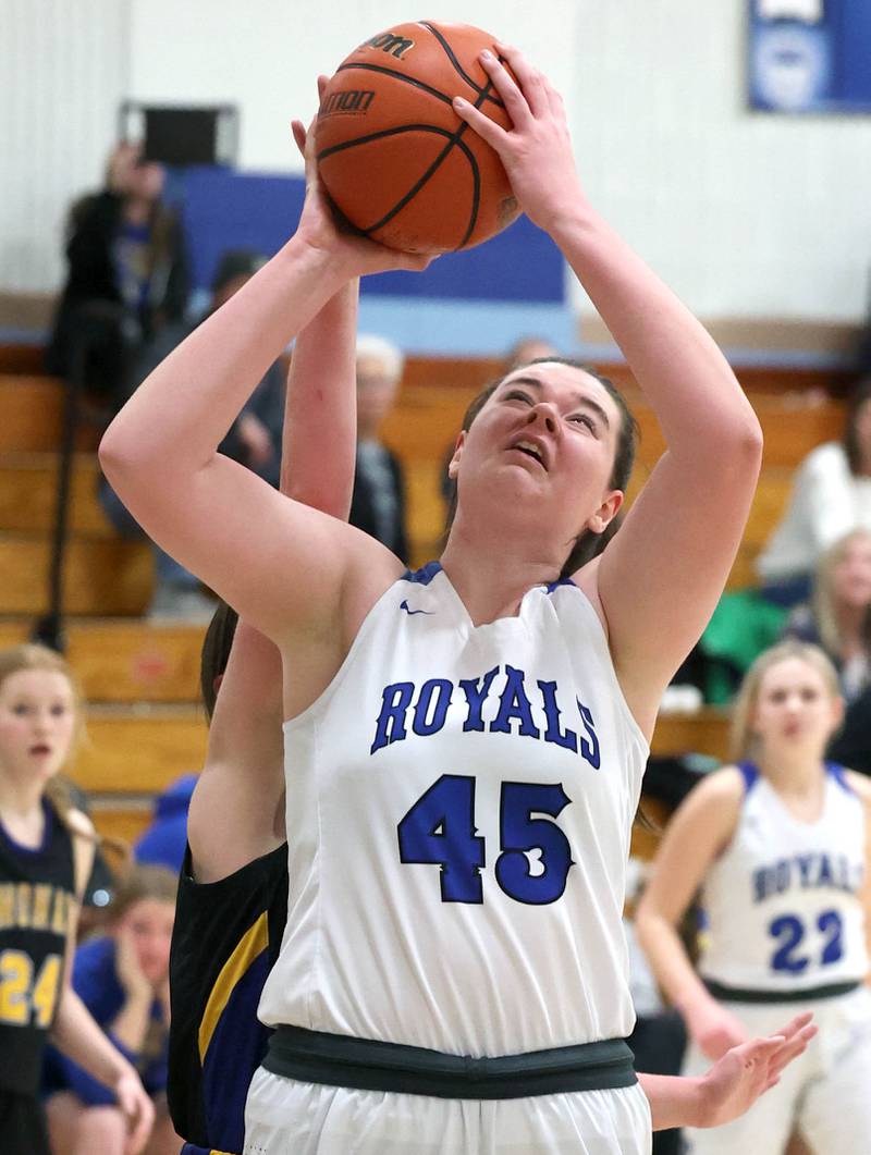 Hinckley-Big Rock's Devin Werner gets a layup in front of a Somonauk defender during their game Thursday, Jan. 12, 2023, at Hinckley-Big Rock High School.