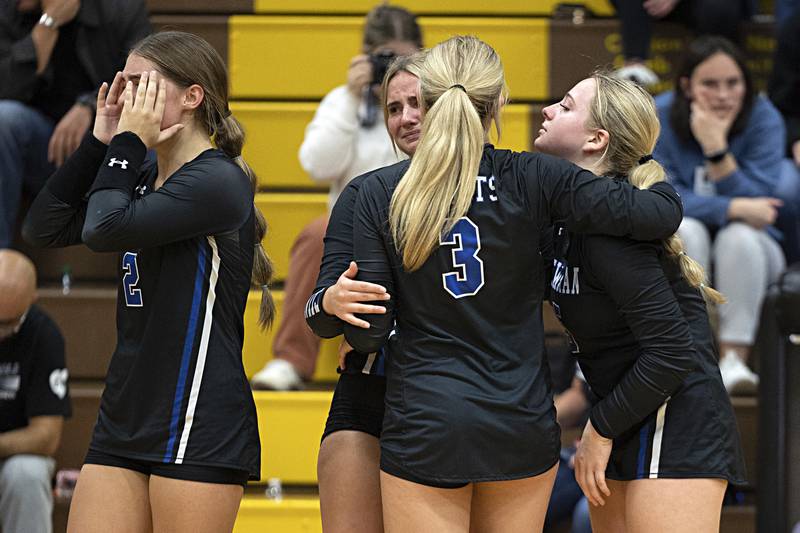 Newman players react to losing in straight sets the Rock Falls Thursday, Oct. 26, 2023 in the class 2A regional finals at Riverdale.
