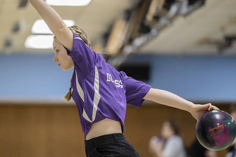 Dixon’s Allison Coss makes her approach Thursday, Dec. 1, 2022 against Sterling.