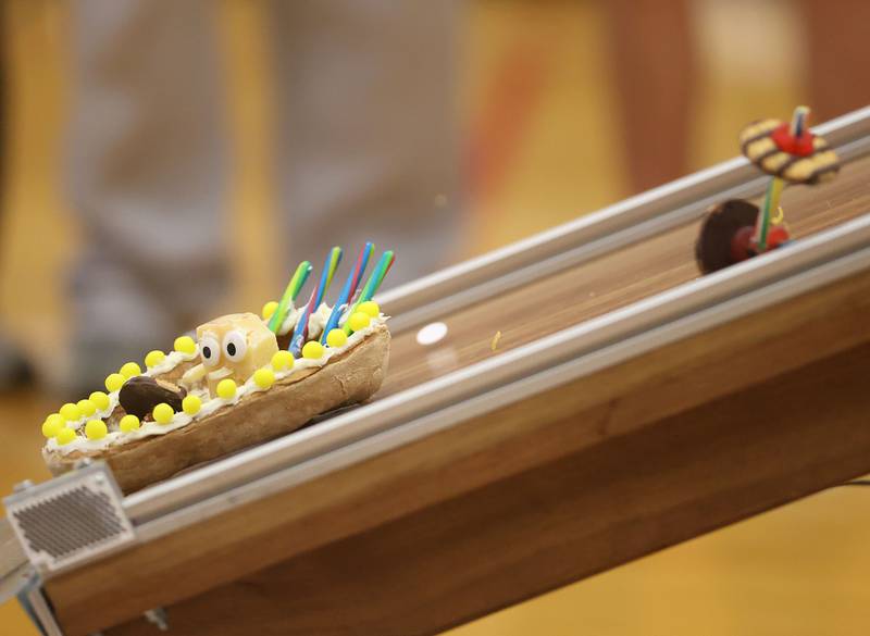 A car falls apart while going down the ramp during the Edible Car Contest on Wednesday, Feb. 25, 2026 at Illinois Valley Community College in Oglesby.
