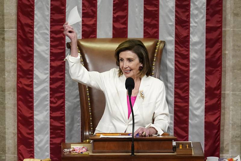 Speaker of the House Nancy Pelosi, D-Calif., presides over House passage of President Joe Biden's expansive social and environment bill, at the Capitol in Washington, Friday, Nov. 19, 2021. (AP Photo/J. Scott Applewhite)