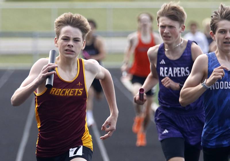 Richmond-Burton’s Quinn Rockwell runs to the finish line  as he laps runners in the 4X800 meter relay during the Kishwaukee River Conference Boys Track and Field Meet on Tuesday, May 12, 2026, at Johnsburg High School.