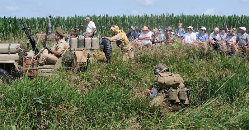 The public could ride through the World War ll mock battles being fought Saturday, July 15, 2023, during the fourth annual Ottawa Military Show, north of Ottawa.