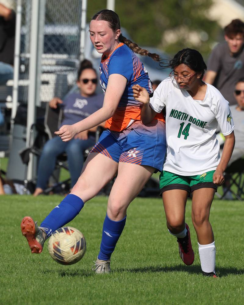 Genoa-Kingston's Olivia Leonforte kicks the ball away Thursday, April 23, 2026, during their game against North Boone at Genoa-Kingston High School.