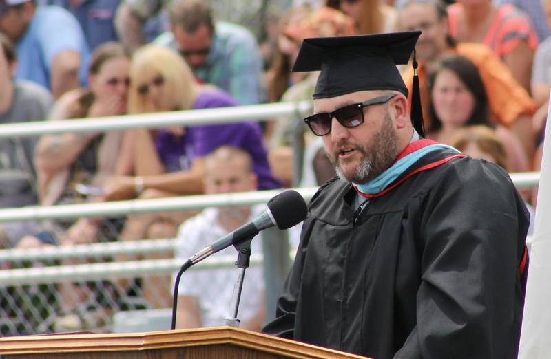 Principal Jared Shaner gives a short address on Sunday, May 28, 2023, at Dixon High School's Class of 2023 graduation.