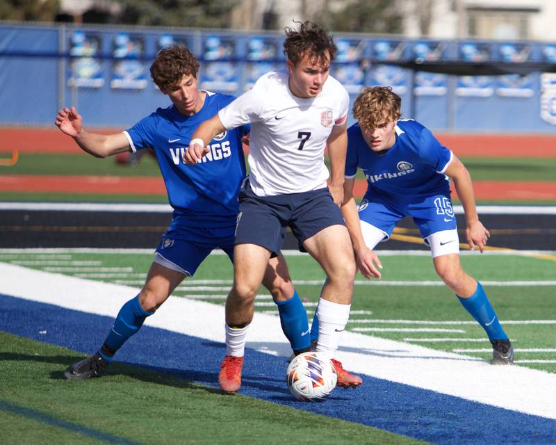 Conant's Krystian Niziolek controls the ball against Geneva's Max Sliwa at the Class 3A St. Charles North Sectional Final on Saturday, Nov.2,2024 in St. Charles.
