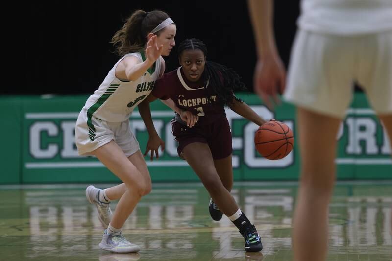 Lockport’s Brooke Smith drives to the paint against Providence.