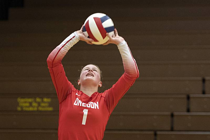 Oregon’s Madison Shaffer sets the ball against Rock Falls Tuesday, Oct. 24, 2023 at the Riverdale volleyball regional.