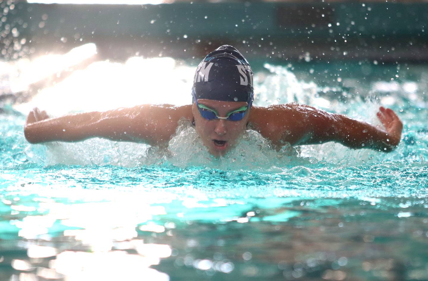 Dundee-Crown co-op’s Maggie Nowak competes in the 100-yard butterfly during the Fox Valley Conference Championship Meet at Woodstock North High School on Saturday, Nov. 2, 2024 in Woodstock .