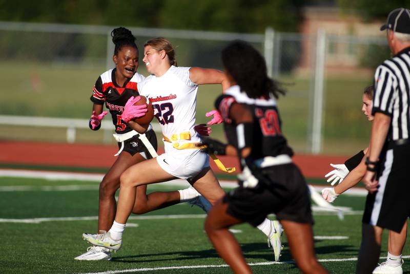 West Aurora’s Claire Anderson runs the ball during a flag football game Wednesday, Sept. 4, 2024 in Yorkville.