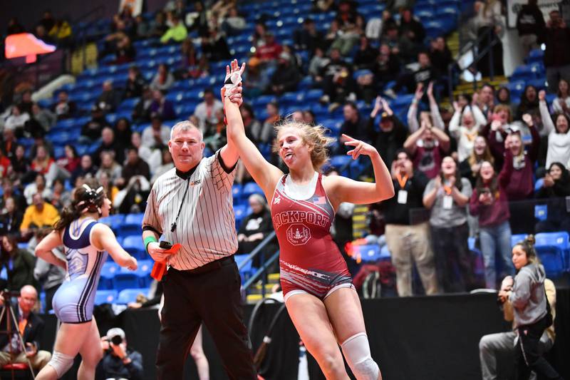 Claudia Heeney of Lockport Township celebreates her 135-pound championship match victory over Viola Pianetto of Mt. Prospect in the IHSA Girls Individual State Finals on Saturday, March 1.