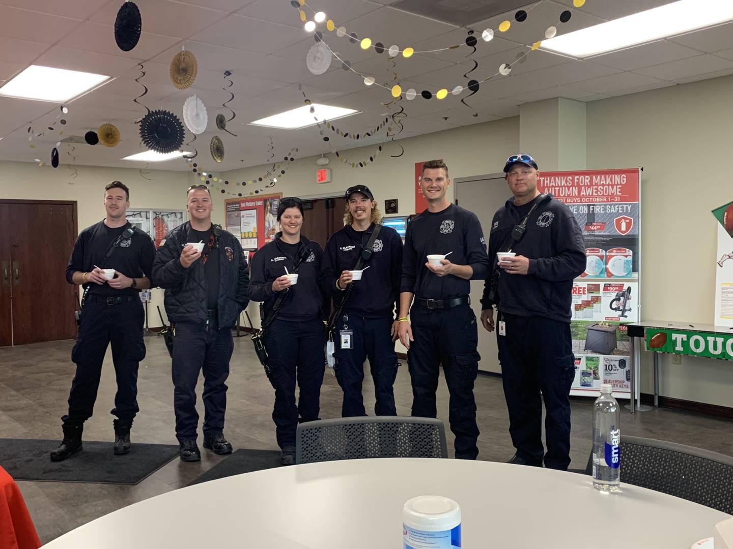 Members of the Princeton Fire Department prepare to judge entries in the employee chili cook-off.