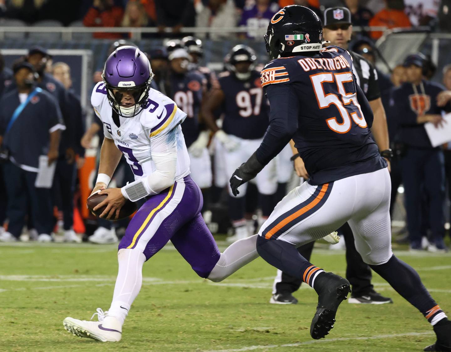 Minnesota Vikings quarterback J.J. McCarthy scrambles away from Chicago Bears defensive end Dayo Odeyingbo during their game Monday, Sept. 8, 2025, at Soldier Field in Chicago.