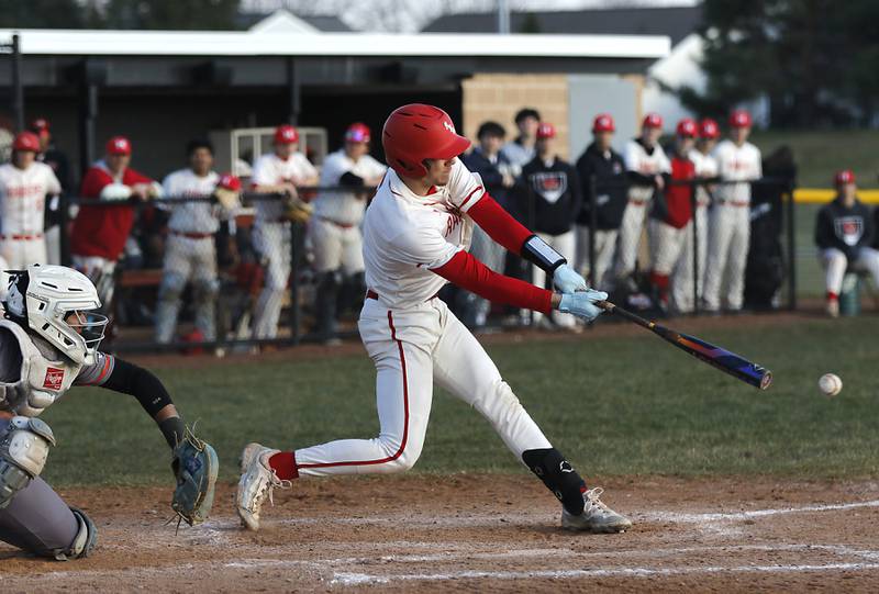 Huntley's Drew Borkowski swings at a pitch during a Fox Valley Conference baseball game against McHenry on Friday, April 11, 2025, at Huntley High School.