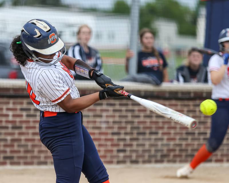Oswego's Jaelynn Anthony (20) connects on a pitch during Class 4A Oswego Regional final softball game between Yorkville at Oswego. May 24th, 2024.