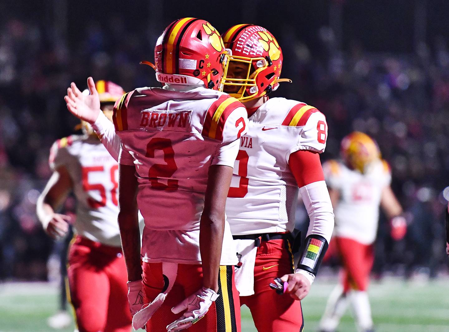 Batavia's Isaiah Brown (2) celebrates with Michael Vander Luitgaren after scoring a touchdown during the Class 7A semifinal playoff game against Lincoln-Way Central on Saturday, Nov 23, 2024 at New Lenox. (Dean Reid for Shaw Local News)