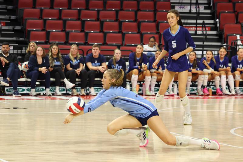 Nazareth's Tess Tortorello digs a hit during Nazareth's victory in two sets, 25-16, 25-17, over Providence in the IHSA Class 3A State semifinals on Friday, Nov. 14, 2025.