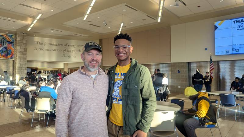 Jason Bentsen of Joliet (left), founder of the nonprofit Love Moves Us, volunteered at the MLK Day of Service with his son Truett Bentsen, 17, and a student at Joliet Central High School on Monday, January 20, 2025, at Joliet Central High School. Truett Bentsen also received a $1,500 scholarship along with the Michael Austin Clark Community Service Award at the event. Joliet West High School student Austin Kittl also received the scholarship and award.