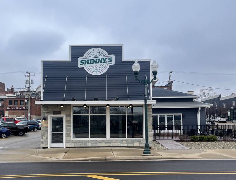 View of Shinny's Bar's storefront from across the street