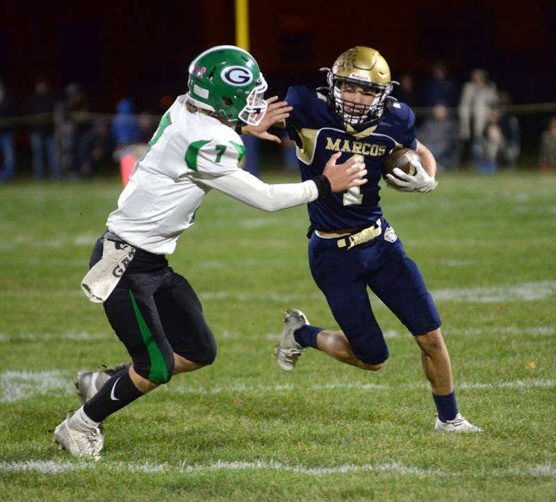 Polo's Mercer Mumford (1) fights off Alden-Hebron's JP Stewart (7) during 8-man playoff action on Friday, Nov. 1, 2024 in Polo.