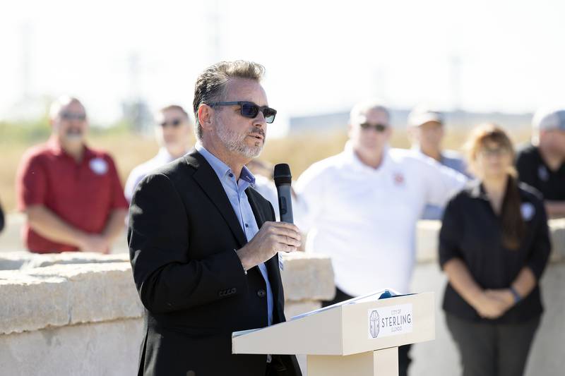 Ron Clewer of Gorman and Associates speaks about the history of steel and hardware in Sterling during the ground breaking of the new Riverfront Park Tuesday, October. 1, 2024.