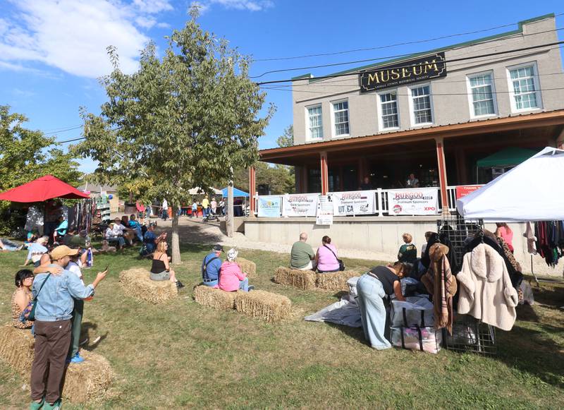 A crowd listens to live music at the La Salle County Historical Society Museum during the 55th annual Burgoo Festival on Sunday, Oct. 12, 2025 in Utica.