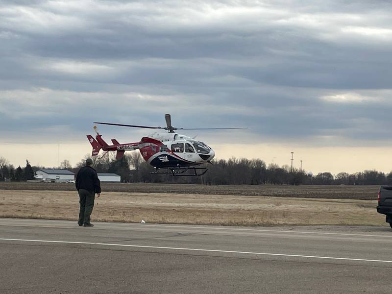 A LifeFlight helicopter ascends bearing an unidentified patient injured in a rollover crash reported before 11:30 a.m. Monday on East Eighth Road and North 3150th Road. A full report is pending from the La Salle County Sheriff's Office.