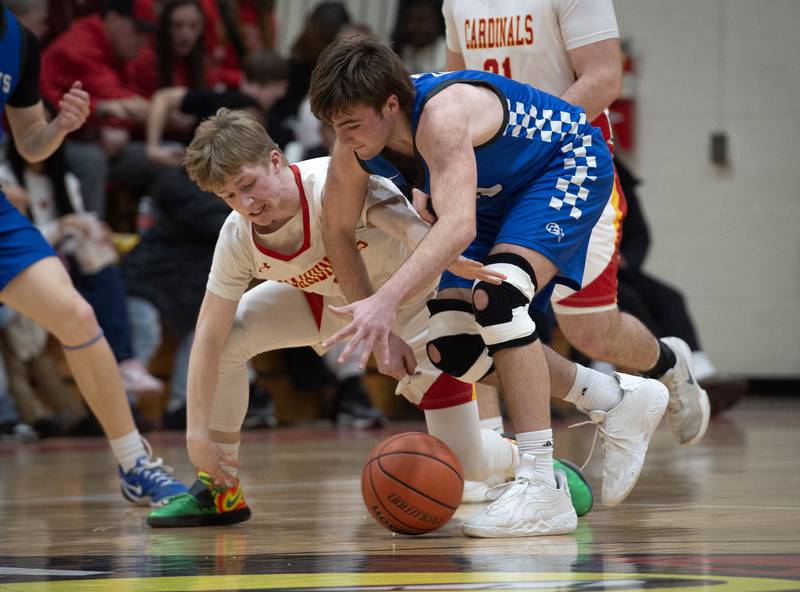 St. Anne's Brigham Hays, left, looks to pick the ball from Clifton Central's Blake Chandler in the RVC Tournament Championship on Friday, Feb. 13, 2026.