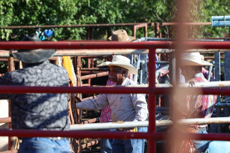 Mike Latting, owner of Latting Rodeo Productions, helps out near the bullpen during the 50th Pembroke Rodeo on Sunday, May 24, 2026.