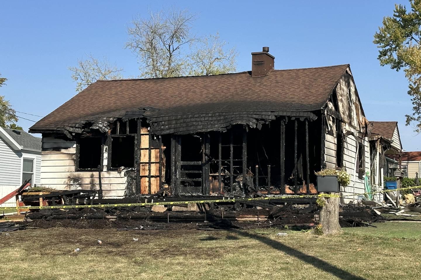 The aftermath of a house fire near the intersection of Plum and 14th Street on Friday, Oct. 11, 2024 in Peru.