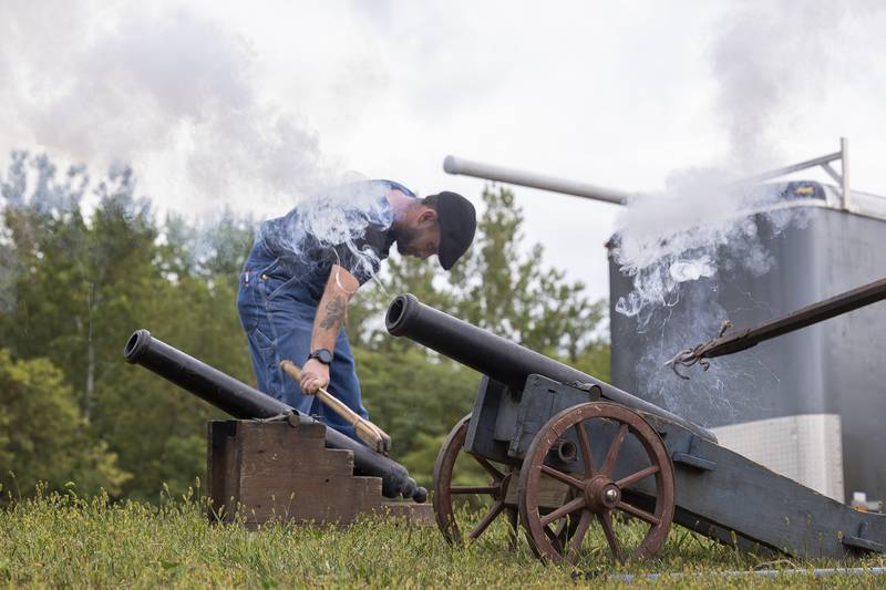 A reenactment group demonstrates canon fire at Dixon’s Fall and Fantasy Fest Saturday, Sept. 20, 2025. The second annual two-day event was held at Granny Rose Animal Shelter.