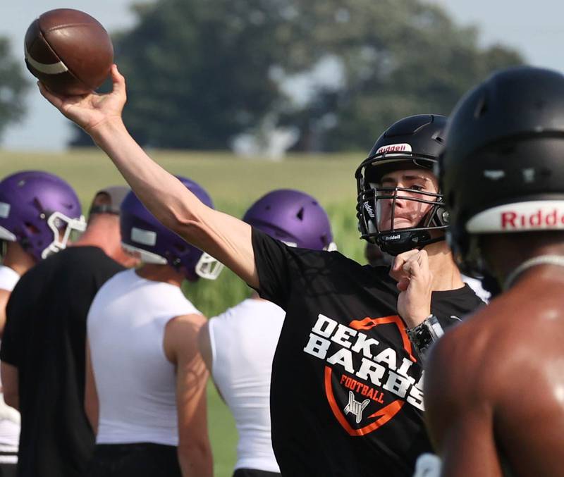 DeKalb’s Cole Latimer throws a pass Tuesday, July 16, 2024, during their matchup with Woodstock North in the Kaneland 7-on-7 at the school in Maple Park.