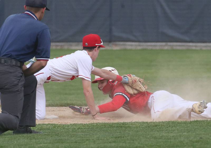 Streator's Blaize Bressner is tagged out attempting to steal second base by Ottawa's Colt Bryson during the Class 3A Regional semifinal game on Thursday, May 29, 2025 at Pontiac High School.