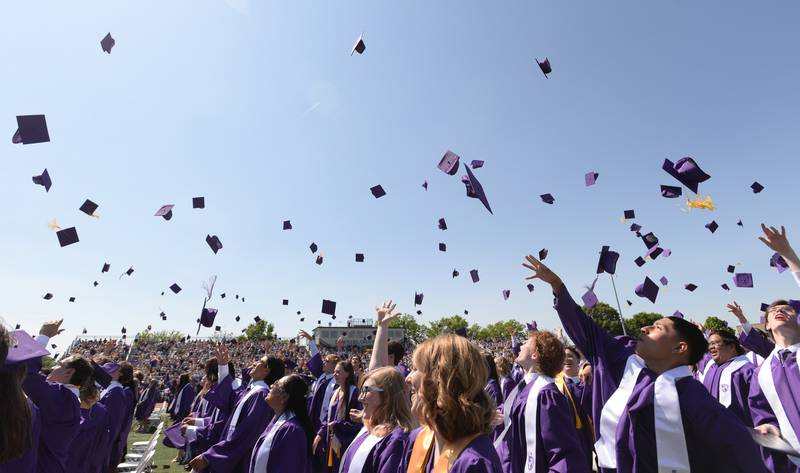 Downers Grove North graduates celebrate their graduation Sunday May 21, 2023.