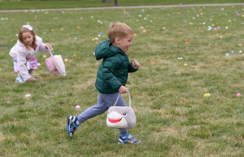 Rory and Molly Muir of Glen Ellyn participate in the Easter Egg Hunt held at Cantigny  Sunday April 13, 2025. Each child was allowed 5 eggs that contained a prize.