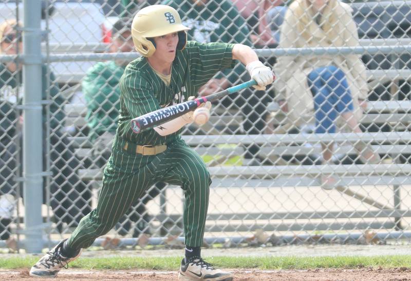 St. Bede's Alec Tomsha attempts a bunt against Marquette on Tuesday, April 28, 2026 at Masinelli Field in Ottawa.