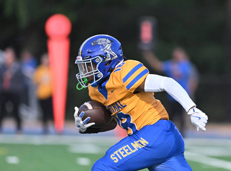 Joliet Central's Tristen Sellers (18) in action during the conference game against Plainfield East on Friday, SEP. 12, 2025, at Joliet.
