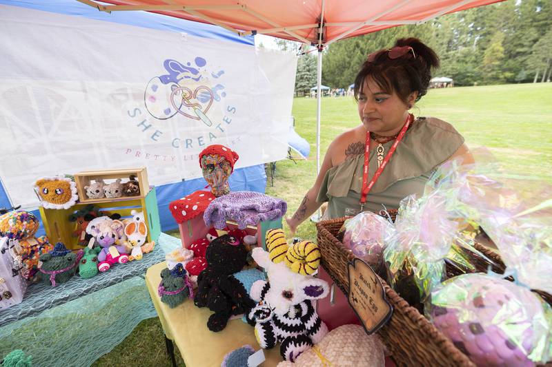 Crochet artist Serena Hall of Sterling talks about her creations Saturday, Sept. 21, 2024, at Fall and Fantasy Fest in Lowell Park.