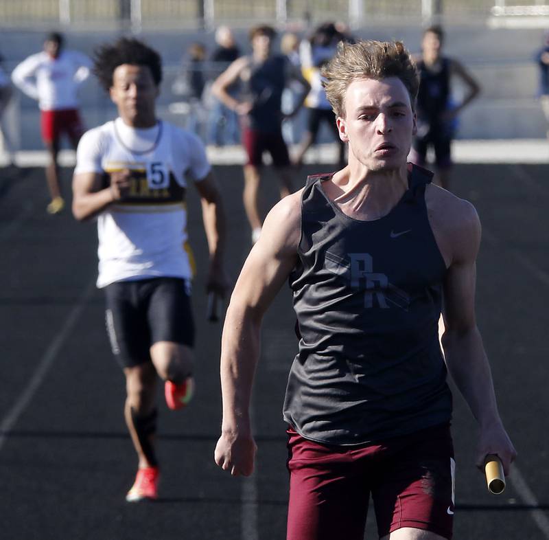 Prairie Ridge's Jacob Prechel runs to the finish line to win the 4x100 meter relay during the IHSA Class 2A Richmond-Burton Sectional Boys Track and Field Meet on Wednesday, May 20, 2026, at Richmond-Burton High School.
