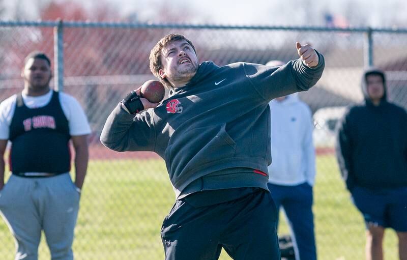 Yorkville’s Kyle Clabough competes in the shot put during the Matt Wulf Invitational track and field meet at Yorkville High School on Thursday, April 14, 2022.